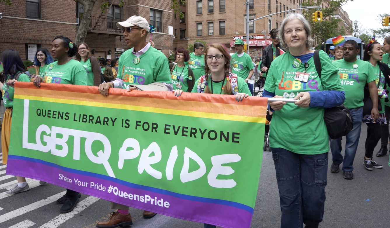 Queens Public Library marched in the 2018 Queens Pride Parade in Jackson Heights.
